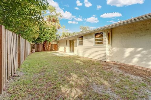 1301 Grand Canal Dr, Naples FL 34110-1506 exterior