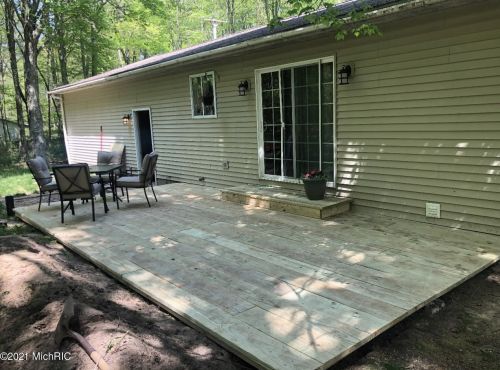 5541 Lamos Rd, Sylvan Beach MI 49461-9450 exterior