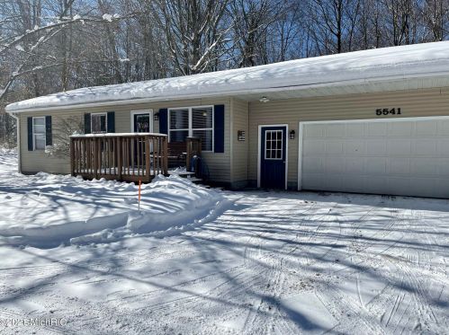 5541 Lamos Rd, Sylvan Beach MI 49461-9450 exterior