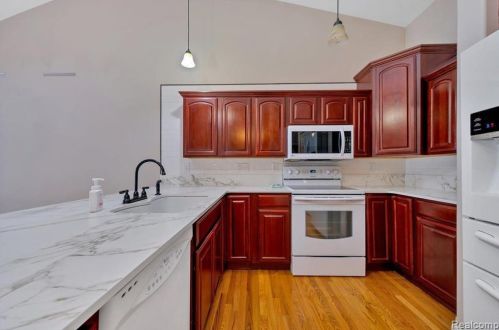 418 Devonshire Dr, Lake Nepessing MI 48446-4796 exterior