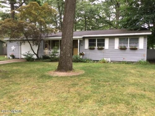 7718 Easy St, Sylvan Beach, MI 49461-9305