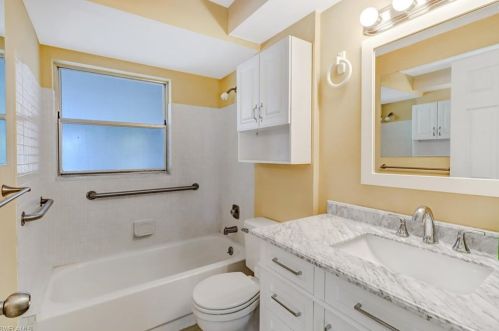 1301 Grand Canal Dr, Naples FL 34110-1506 exterior