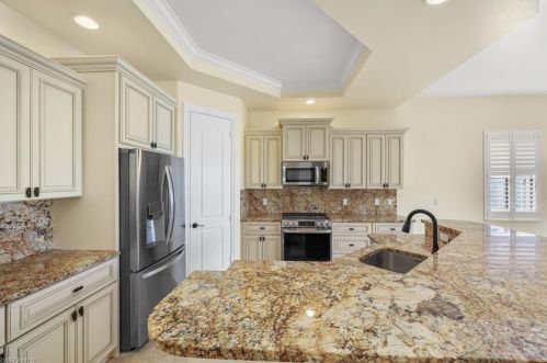 1430 Serrano Cir, Naples FL 34105-4952 exterior