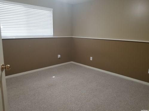 1451 Countrywood Ln, Taylorsville UT 84088-6530 exterior