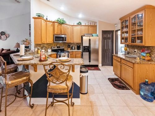 1132 Climbing Rose Dr, Orlando FL 32818-6919 exterior