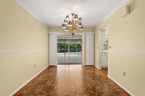59 Pebble Bch Blvd, Naples FL 34113-8349 exterior