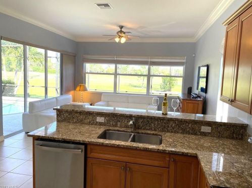 6044 Dogleg Dr, Naples FL 34113-1688 exterior