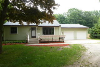 4781 Shore Dr, Sylvan Beach, MI 49461-9611