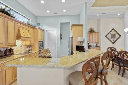 7733 Classics Dr, Naples FL 34113-3043 exterior