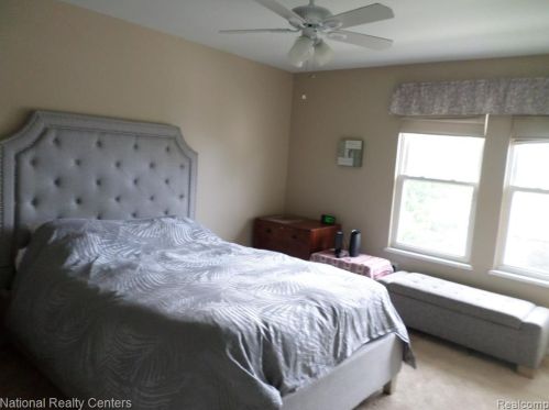 39733 Vlg Wood Ln, Novi MI 48375-4554 exterior