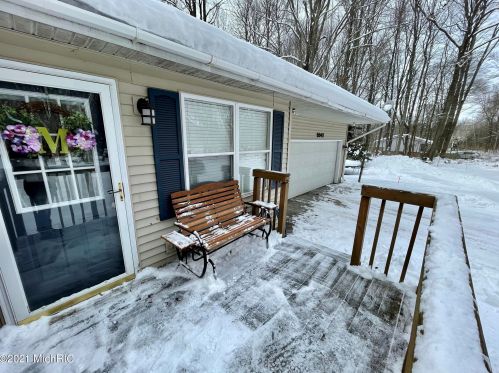 5541 Lamos Rd, Sylvan Beach MI 49461-9450 exterior