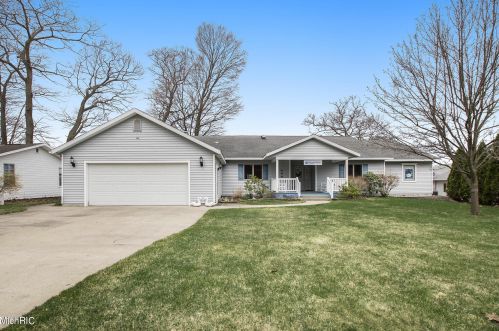 1608 Collier Dr, Sylvan Beach, MI 49461-1900