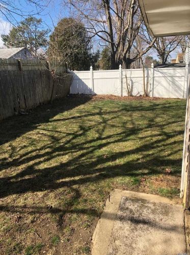 54 Chestnut St, Central Islip, NY 11722-4830