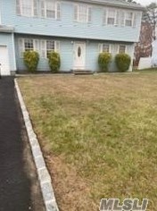 15 Nagle Ln, Central Islip, NY 11722-2416