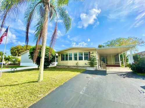 448 Cpe Florida Way, Naples FL exterior