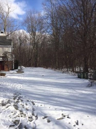 52058 Heatherstone Ave, Macomb Township MI  48042-3554 exterior