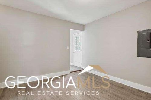 1386 Highgrove Way, Atlanta GA  30349-7510 exterior