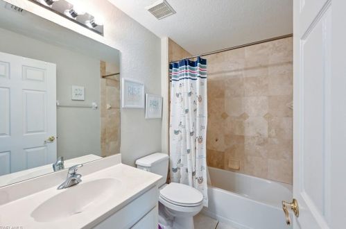 203 Burnt Pne Dr, Naples FL 34119-9775 exterior