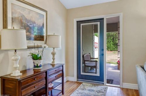 6010 Hidden Oaks Ln, Naples, FL 34119-1134