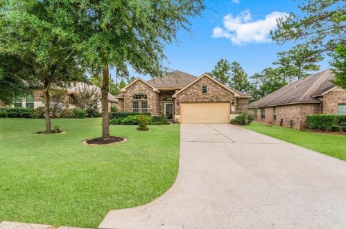 1940 Honey Laurel Dr, Conroe, TX 77304-2156