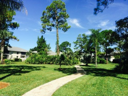 717 Landover Cir, Naples FL 34104-7804 exterior