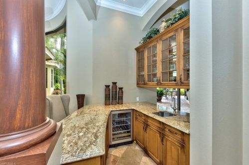 228 Sharwood Dr, Naples FL 34110-5722 exterior