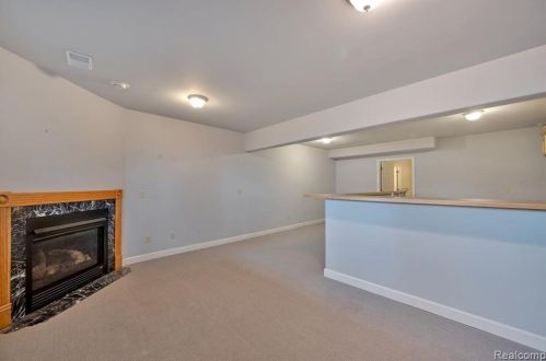 418 Devonshire Dr, Lake Nepessing MI 48446-4796 exterior