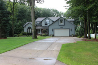 4647 Doug Dr, Sylvan Beach, MI 49461-9647