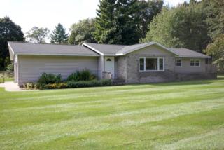 7735 Easy St, Sylvan Beach, MI 49461-9305