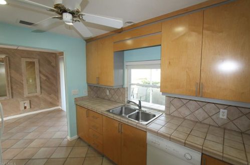 133 Mentor Dr, Naples FL 34110-1327 exterior