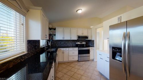 1119 Grv Dr, Naples FL 34120-1423 exterior