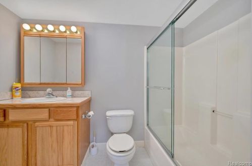 418 Devonshire Dr, Lake Nepessing MI 48446-4796 exterior