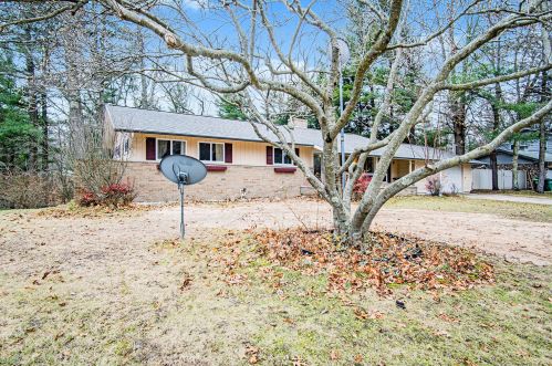 125 Pinecrest Rd, Sylvan Beach MI  49461-1923 exterior