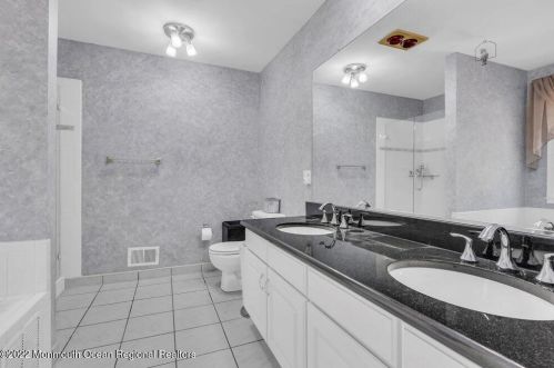 100 Serpentine Dr, Morganville NJ 07751-1400 exterior