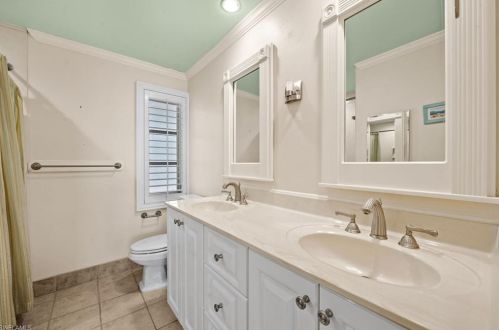 59 Pebble Bch Blvd, Naples FL 34113-8349 exterior