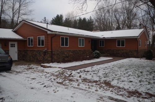 150 Coulter Rd, Lake Nepessing MI  48446-8690 exterior