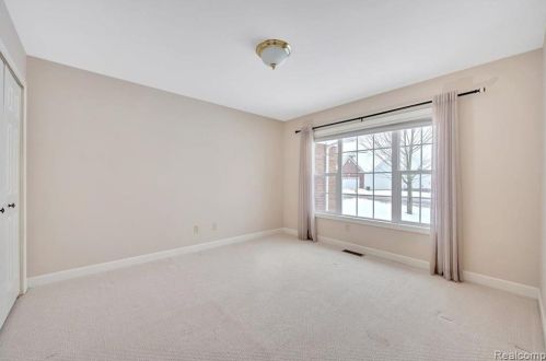 418 Devonshire Dr, Lake Nepessing MI 48446-4796 exterior