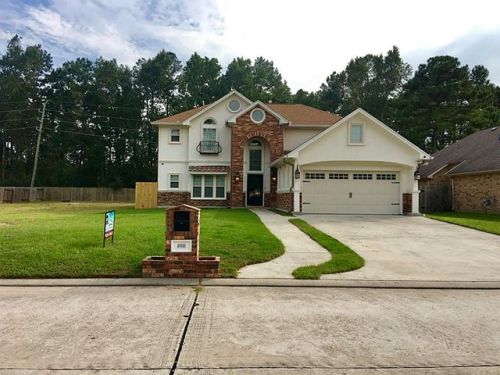 8906 Rolling Rapids Rd, Humble, TX 77346-8064