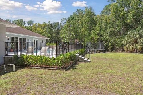 5811 Hidden Oaks Ln, Naples FL 34119-1140 exterior