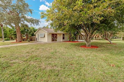 1301 Grand Canal Dr, Naples FL 34110-1506 exterior