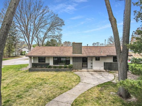 704 Spring St, Sylvan Beach, MI 49461-1154