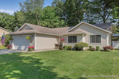 4684 Sandy Ln, Sylvan Beach, MI 49461-9609