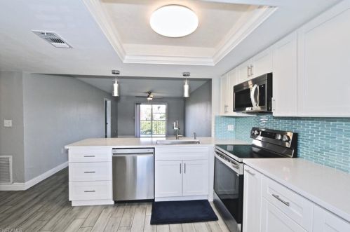 150 Cypress Way, Naples, FL 34110-1245