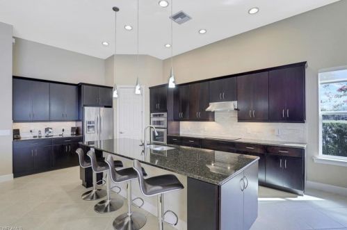 8961 Quarry Dr, Naples FL 34120-5256 exterior