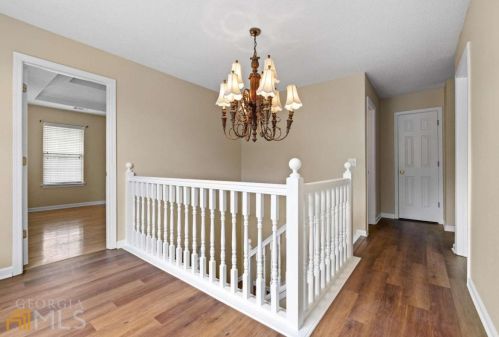 1560 Rogers Crossing Dr, Lithonia GA  30058-7005 exterior