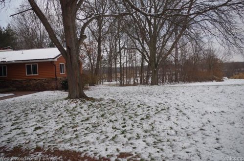 150 Coulter Rd, Lake Nepessing MI  48446-8690 exterior