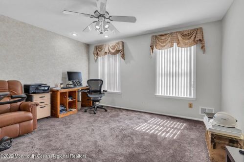 100 Serpentine Dr, Morganville NJ 07751-1400 exterior