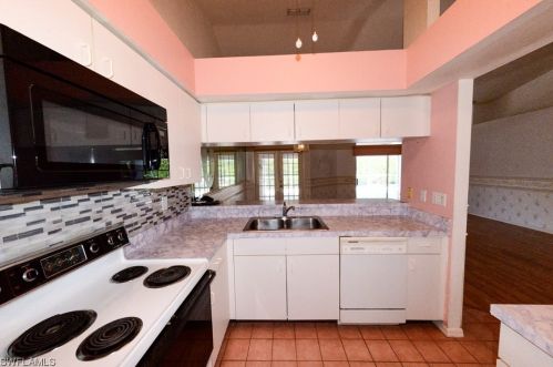 213 Countryside Dr, Naples FL 34104-6720 exterior