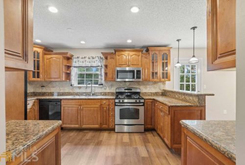 1560 Rogers Crossing Dr, Lithonia GA  30058-7005 exterior