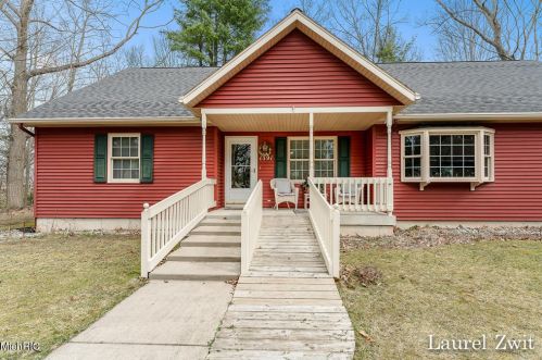 1391 Gee St, Sylvan Beach, MI 49461-1946